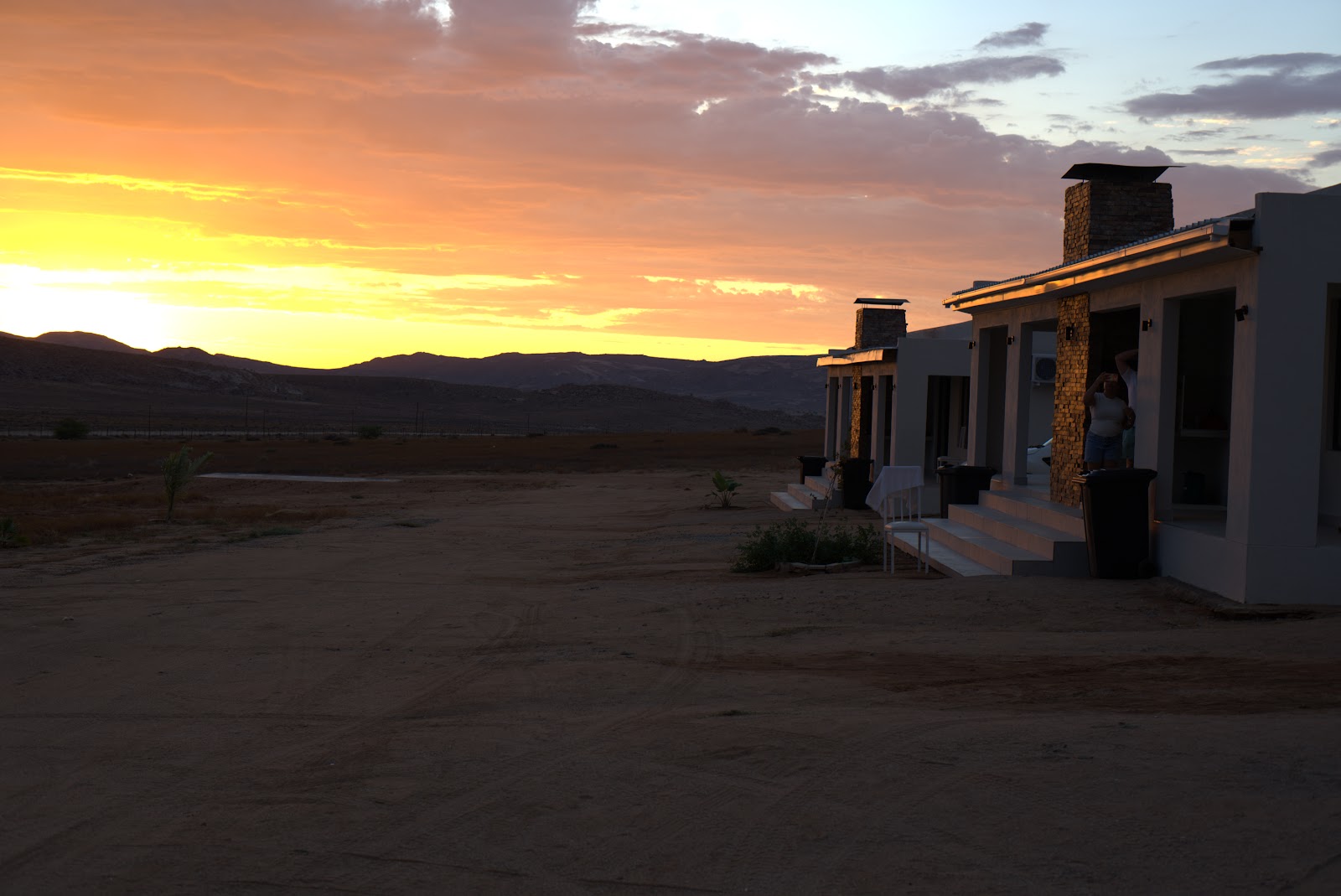 Sunset over the chalets at Springbok Guest Farm
